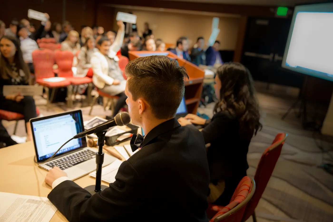 Committee staff and delegates at a Model United Nations session